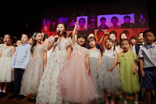 Young singers on stage at the music festival finale
