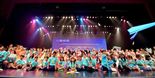 Young artists celebrating at the Youth World Cup award ceremony