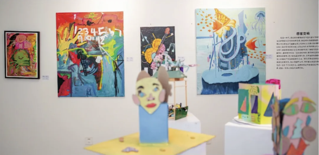 Colourful artworks displayed in a contemporary gallery
